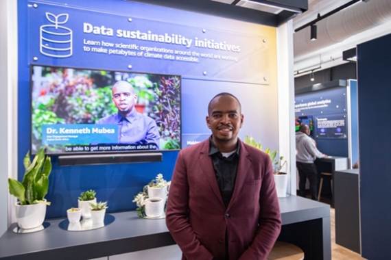 A person standing in front of a screen

AI-generated content may be incorrect.